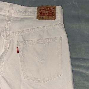 Levi’s white low-waisted ripped jeans